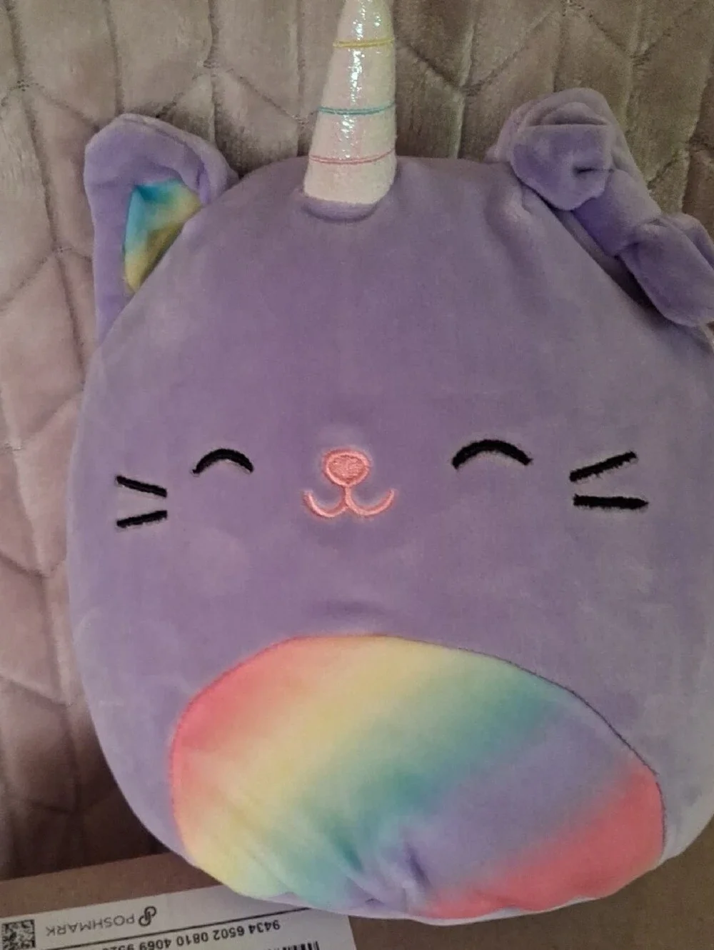 Squishmallows Cienna The Purple Unicorn Cat with Pastel Rainbow Belly.